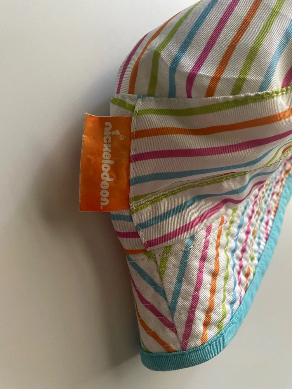Paw Patrol Rainbow Stripe Reversible Bucket Hat in Yellow, Pink, Orange & Blue
